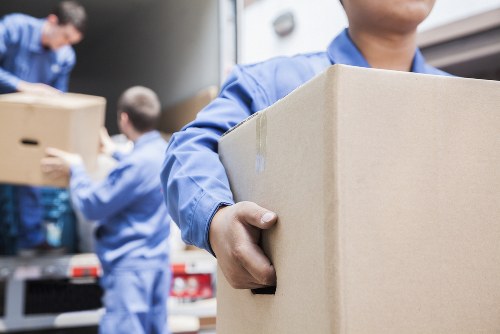 Man with van loading items in Bowespark on a local moving job