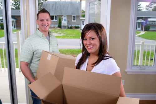 Van moving boxes and furniture during a UK removal service