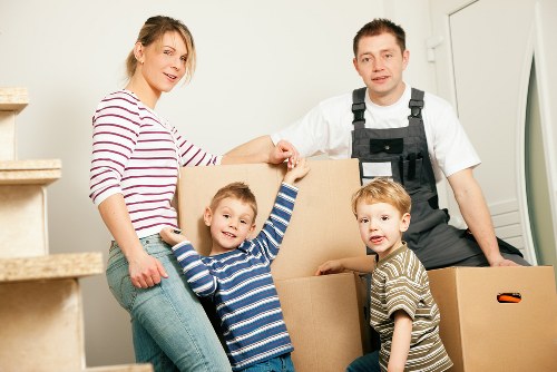 Van loading furniture for a move near Bowespark homes and flats