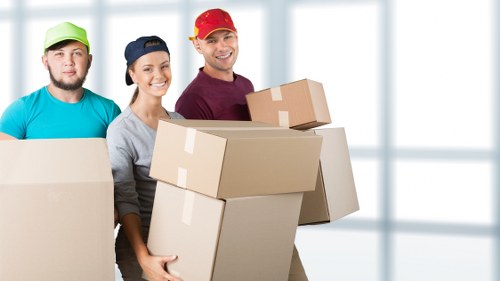 Staff member handling furniture carefully during a Bowespark move
