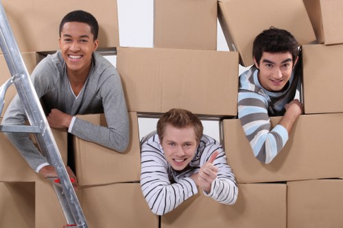 Packed boxes and furniture ready for a home removal service