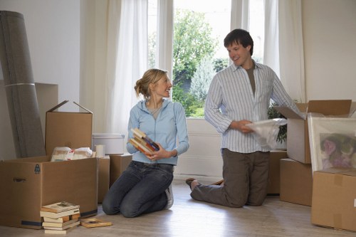 Local movers packing fragile household items in Bowespark